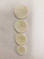 Kunststoffknopf, weiss-creme (melliert) 